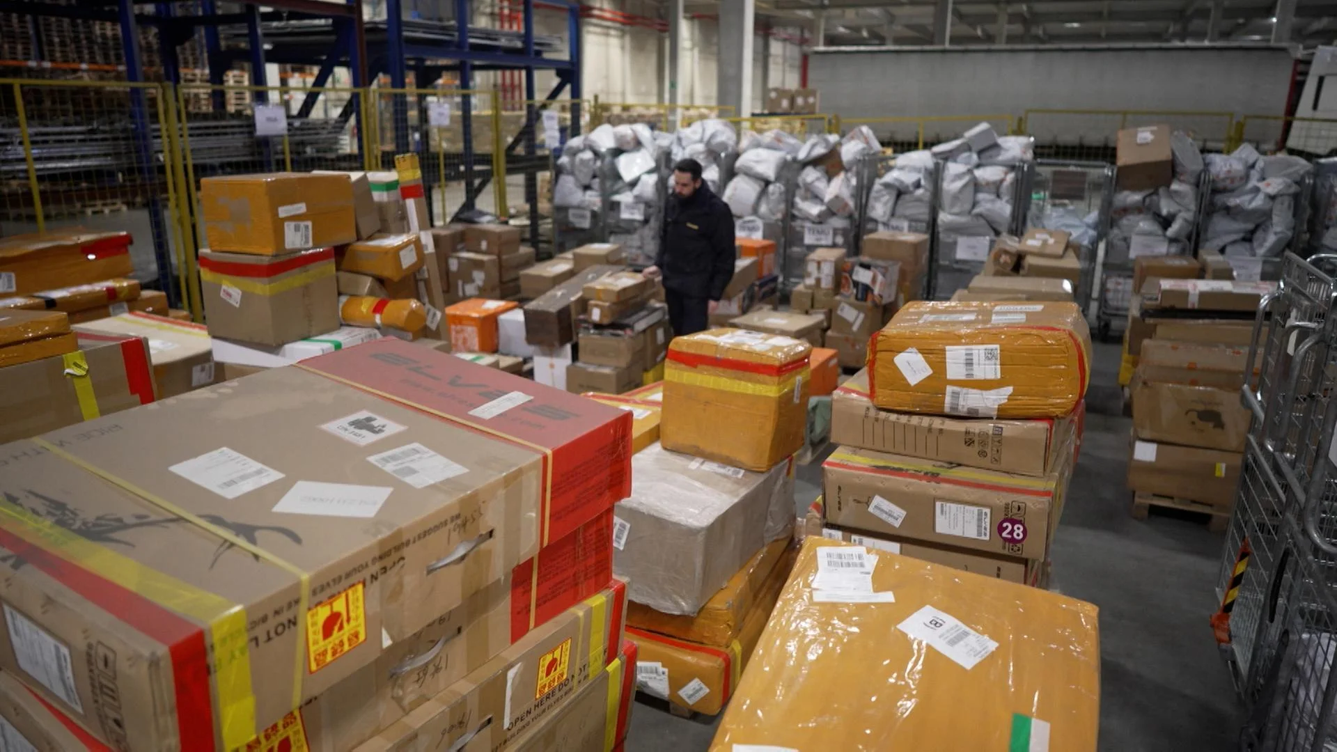 Customs operations at Belgium's Liège Airport, a major hub for international e-commerce shipments.